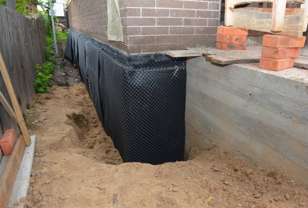 SJ Waterproofing Pros technician performing targeted Vapor Barrier Installation assessment in Webberville, MI